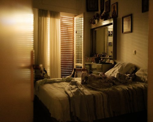 A peaceful home bedroom setting prepared nicely for evening sleep hygiene