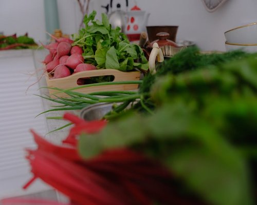 Selection of local Polish grains, vegetables and fresh water on a kitchen counter